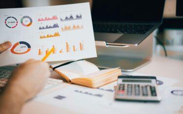 business advisory services - coloured charts on a page.